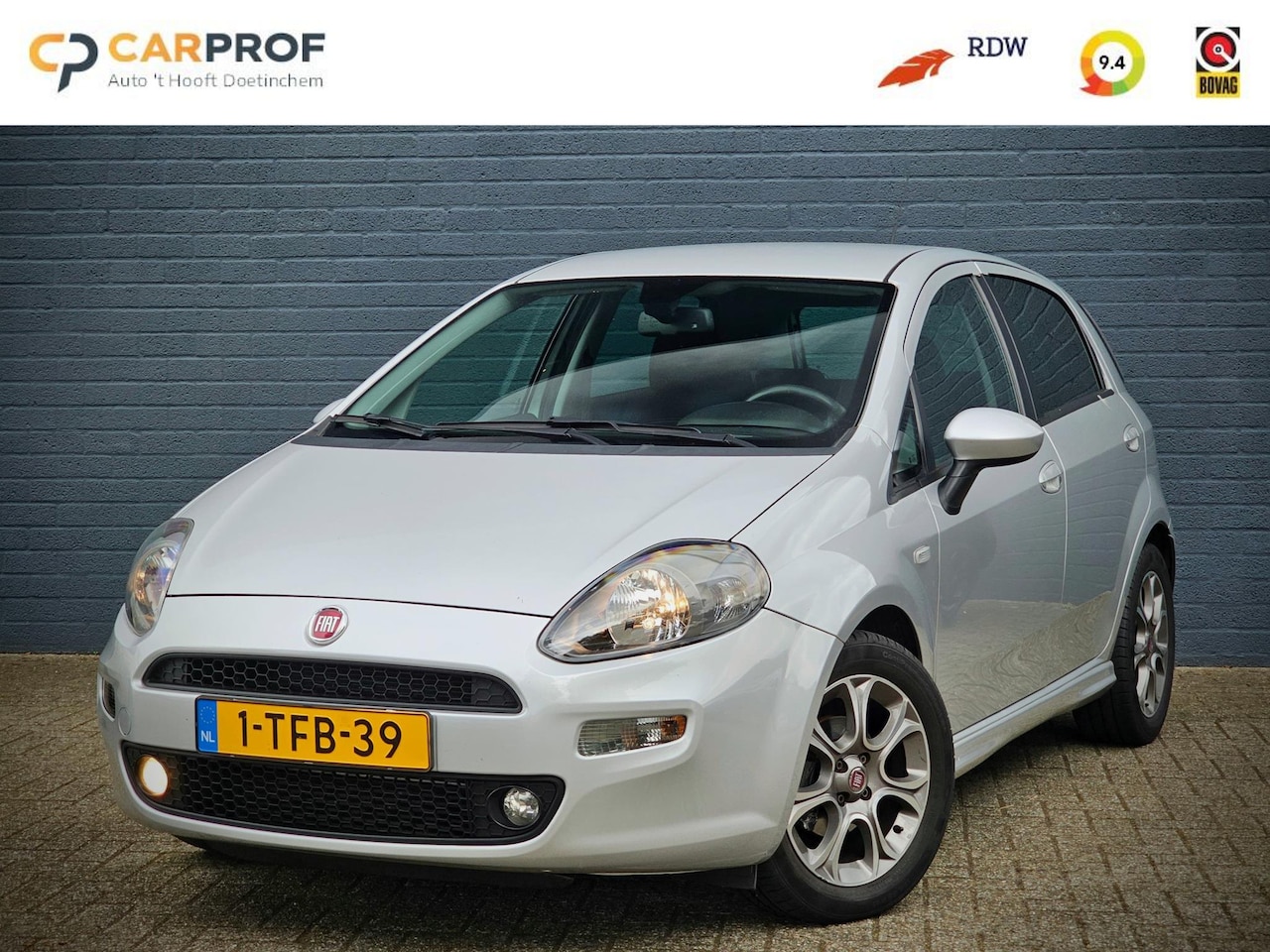 Fiat Punto Evo - 0.9 TwinAir Lounge / CRUISE / 5 DEURS / AIRCO - AutoWereld.nl