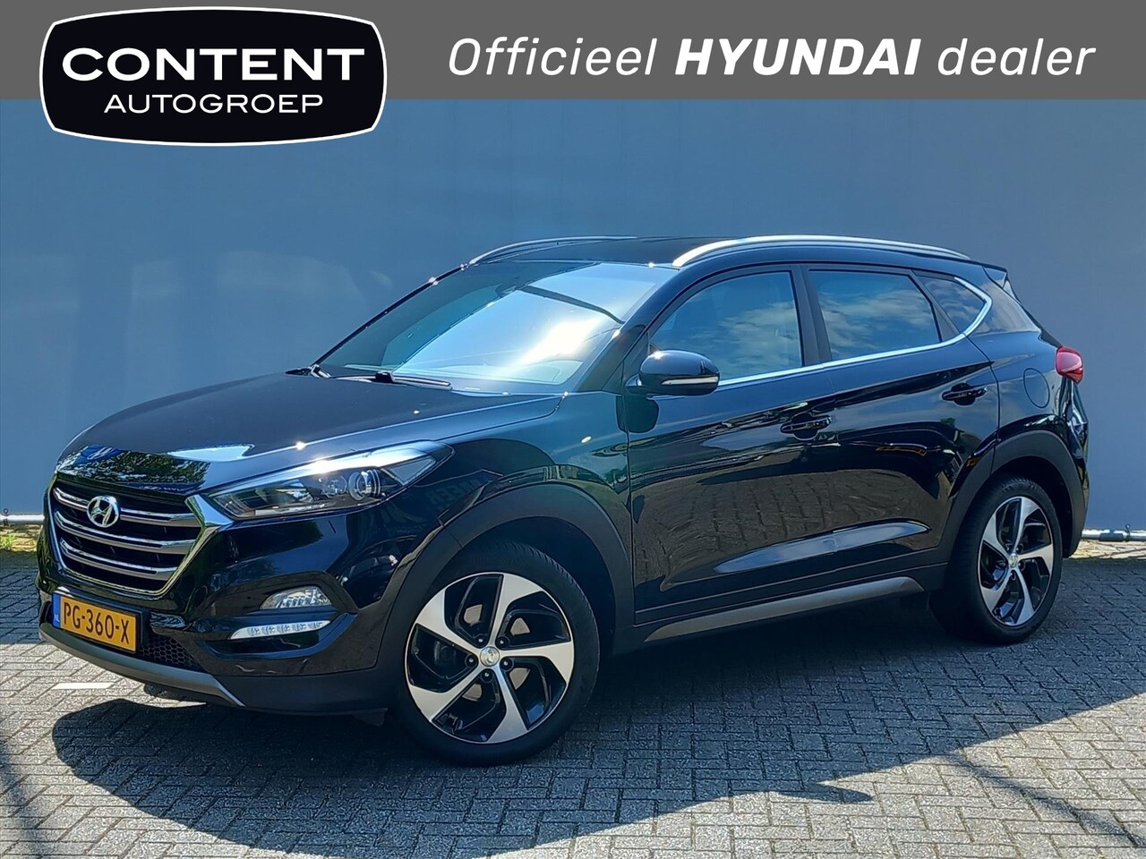 Hyundai Tucson - 1.6 T-GDi 177pk 4WD 7-DCT Premium Edition I Trekhaak I Clima I Navi - AutoWereld.nl