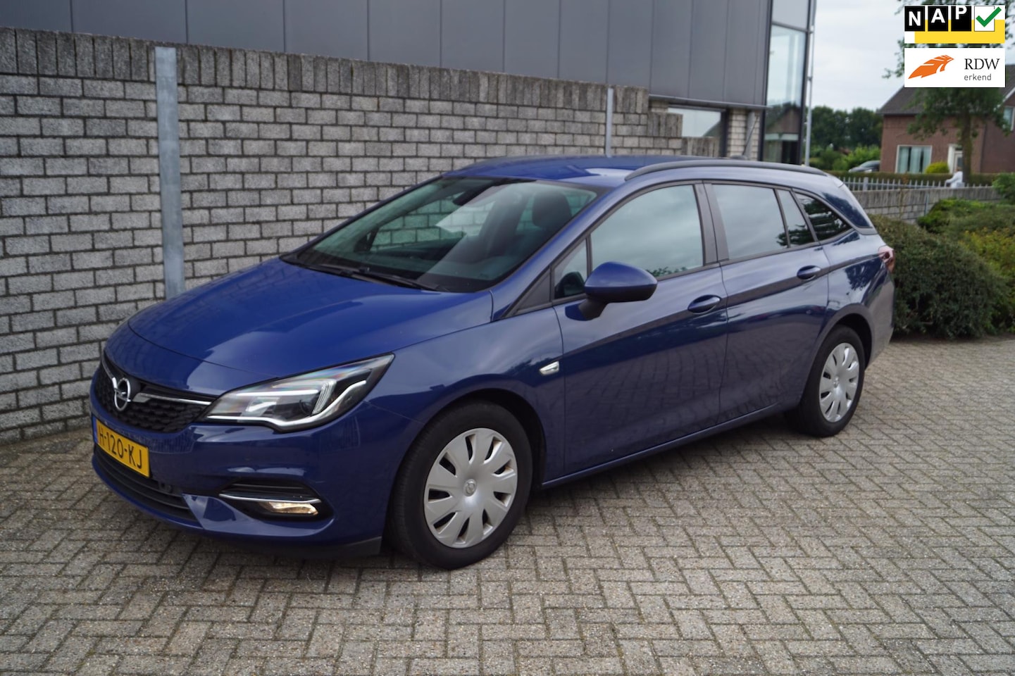 Opel Astra Sports Tourer - 1.4 Business Edition Autom Navi Camera Apple Carplay Clima Cruise 2x PDC Rijbaan Assist Sp - AutoWereld.nl