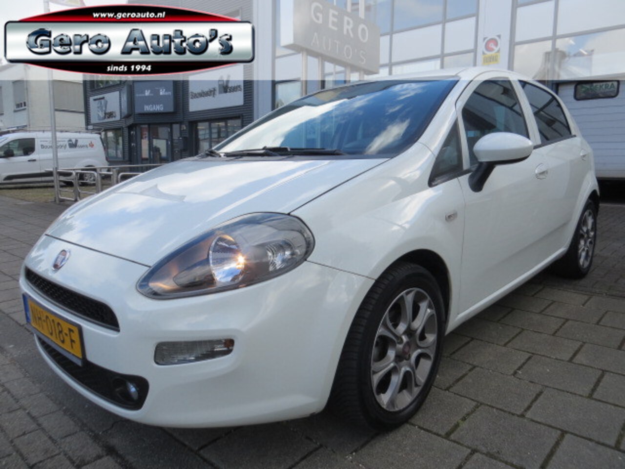 Fiat Punto Evo - 0.9 TwinAir Lounge 5 deurs ,airco ecc,lmv,cruise control - AutoWereld.nl