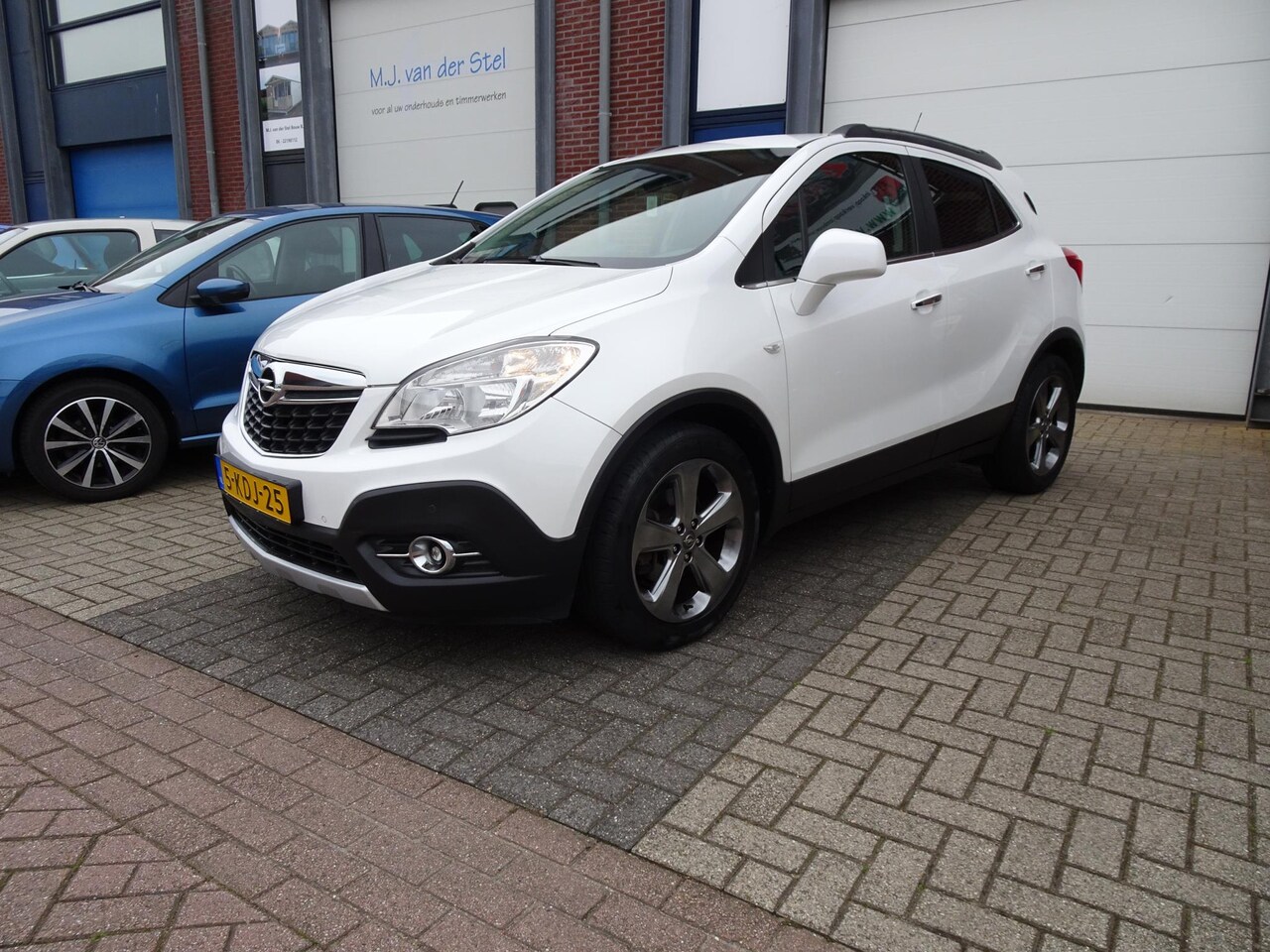 Opel Mokka - 1.6 Cosmo NAVI l FIETSDRAGER l STOELVERW. - AutoWereld.nl