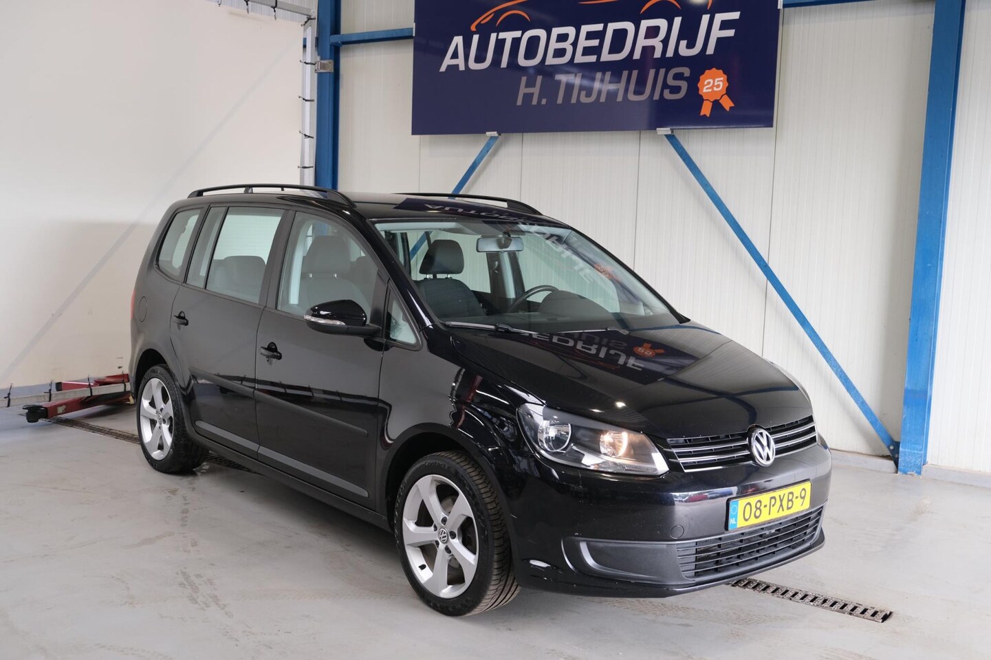 Volkswagen Touran - 1.2 TSI Bluemotion 7p. Airco, Cruise, Trekhaak. - AutoWereld.nl