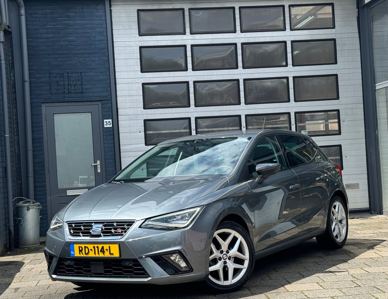 Seat Ibiza - 1.0 TSI FR Business Intense | Clima | Camera | Navi | N.A.P - AutoWereld.nl