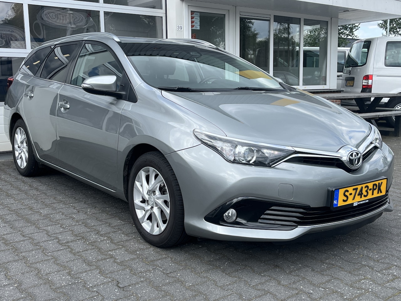 Toyota Auris Touring Sports - 1.2T Energy Plus Automaat Climate control Cruise control Trekhaak - AutoWereld.nl