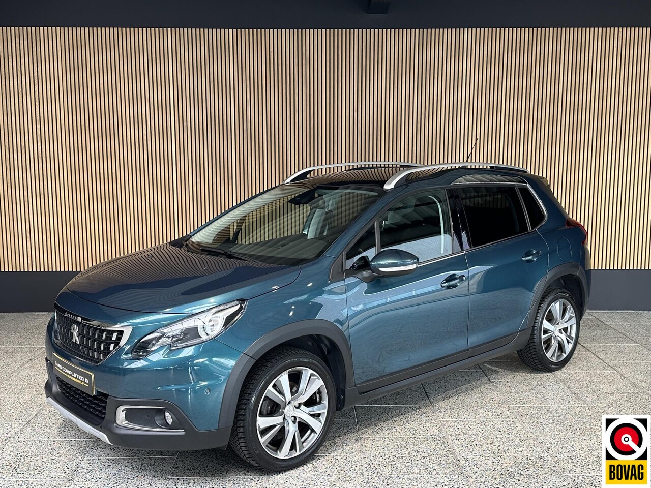 Peugeot 2008 - 1.2 PureTech Blue Lease Allure Navi | Camera | Panoramadak - AutoWereld.nl