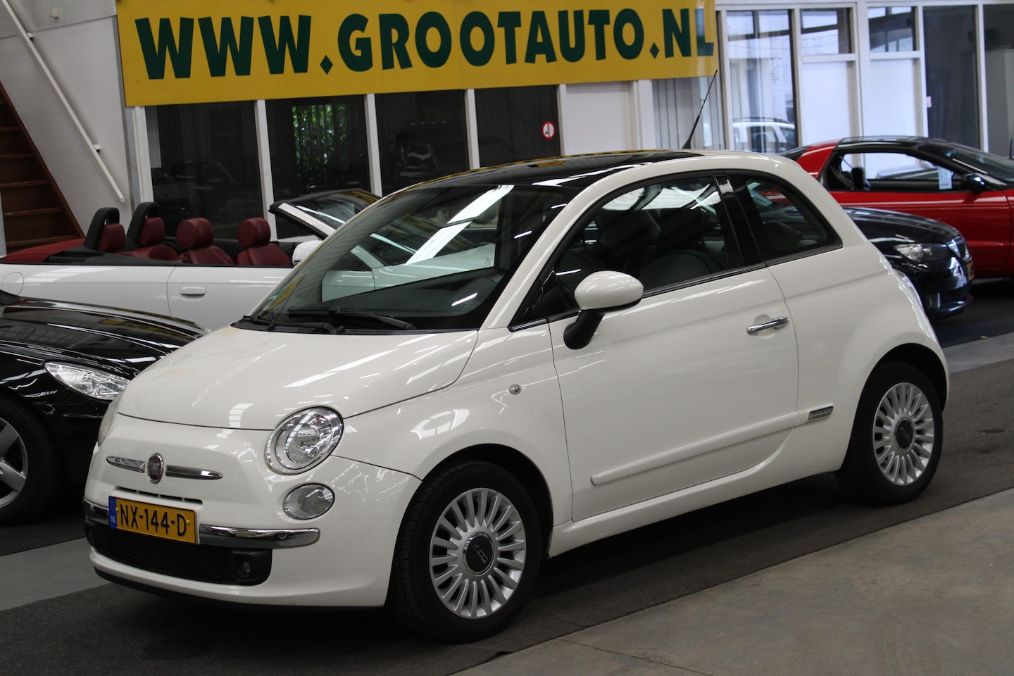 Fiat 500 - 1.2 Naked Panoramadak, Airco, Stuurbekrachtiging - AutoWereld.nl