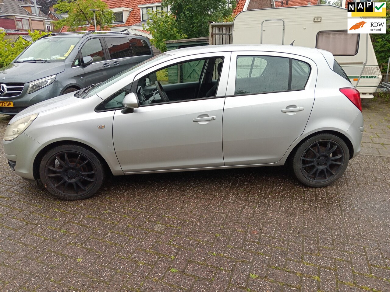 Opel Corsa - 1.2-16V Enjoy MET AIRCO NIEUWE APK - AutoWereld.nl