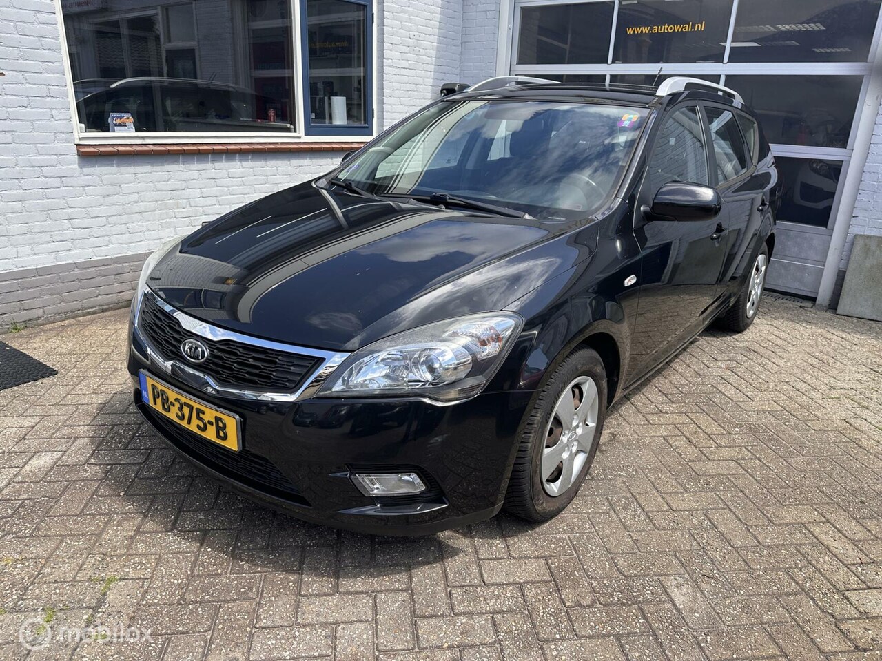 Kia Cee'd Sporty Wagon - 1.4 CVVT X-tra 1.4 CVVT X-tra - AutoWereld.nl