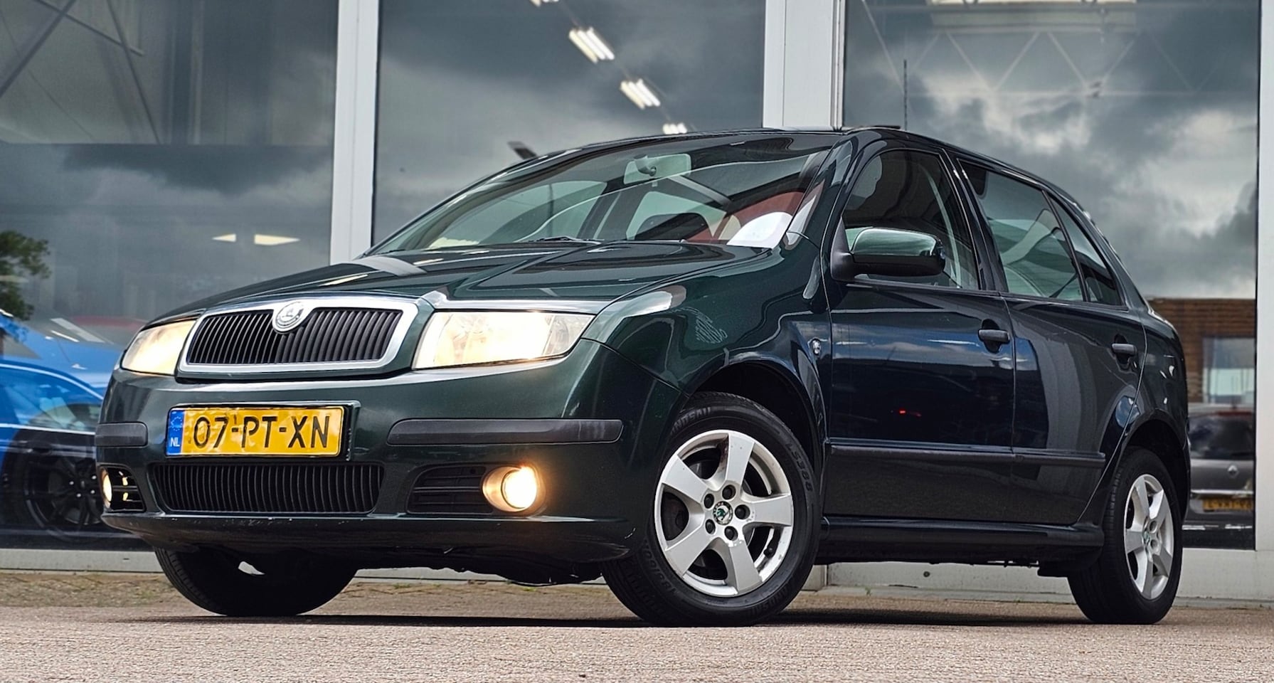 Skoda Fabia - 1.4i 16V Elegance Automaat Opendak Nieuwe APK - AutoWereld.nl