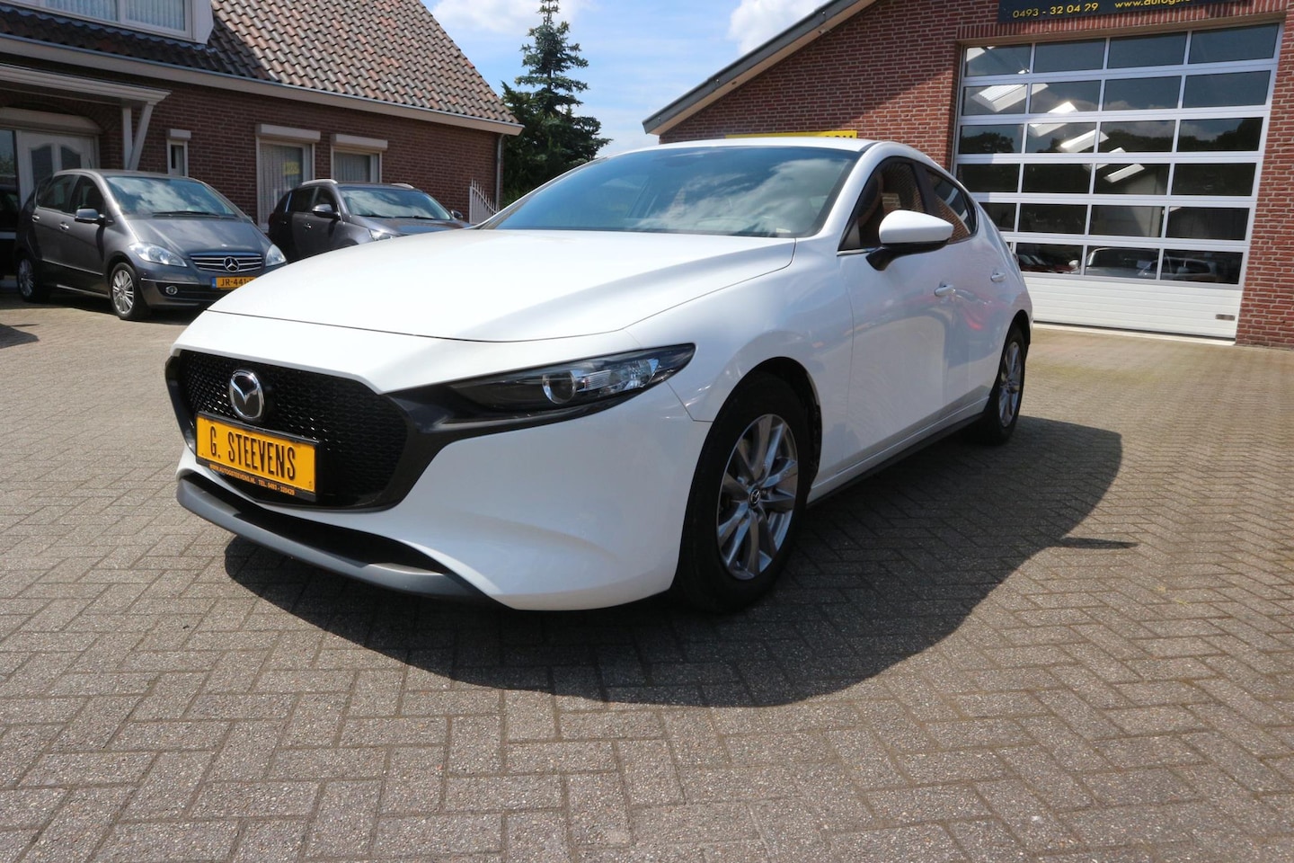 Mazda 3 - 2.0 e-SkyActiv-G M Hybrid 122 Navigatie - AutoWereld.nl