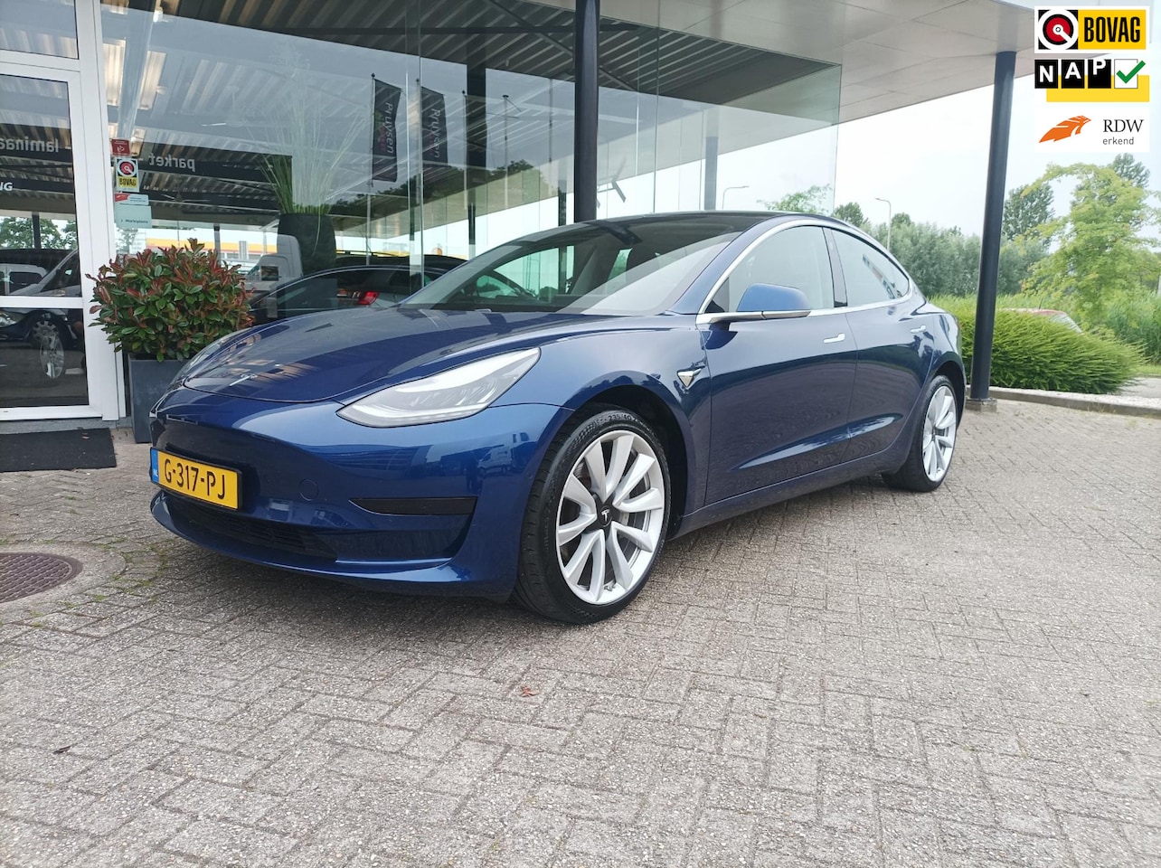 Tesla Model 3 - Standard RWD Plus 60 kWh LEER/MOOIE AUTO/ EERSTE EIGENAAR - AutoWereld.nl