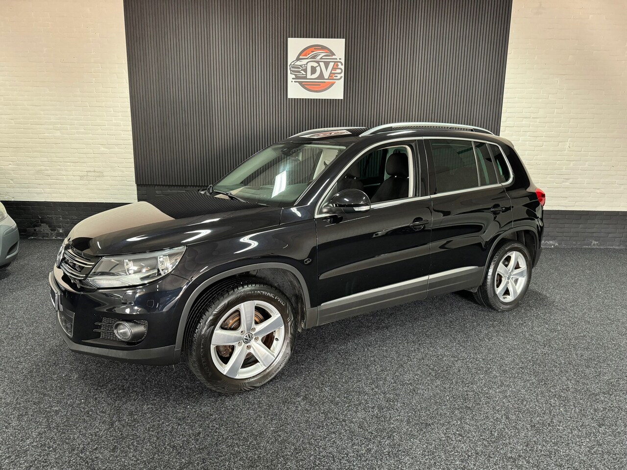 Volkswagen Tiguan - 1.4 TSI Sport&Style 4Motion - AutoWereld.nl