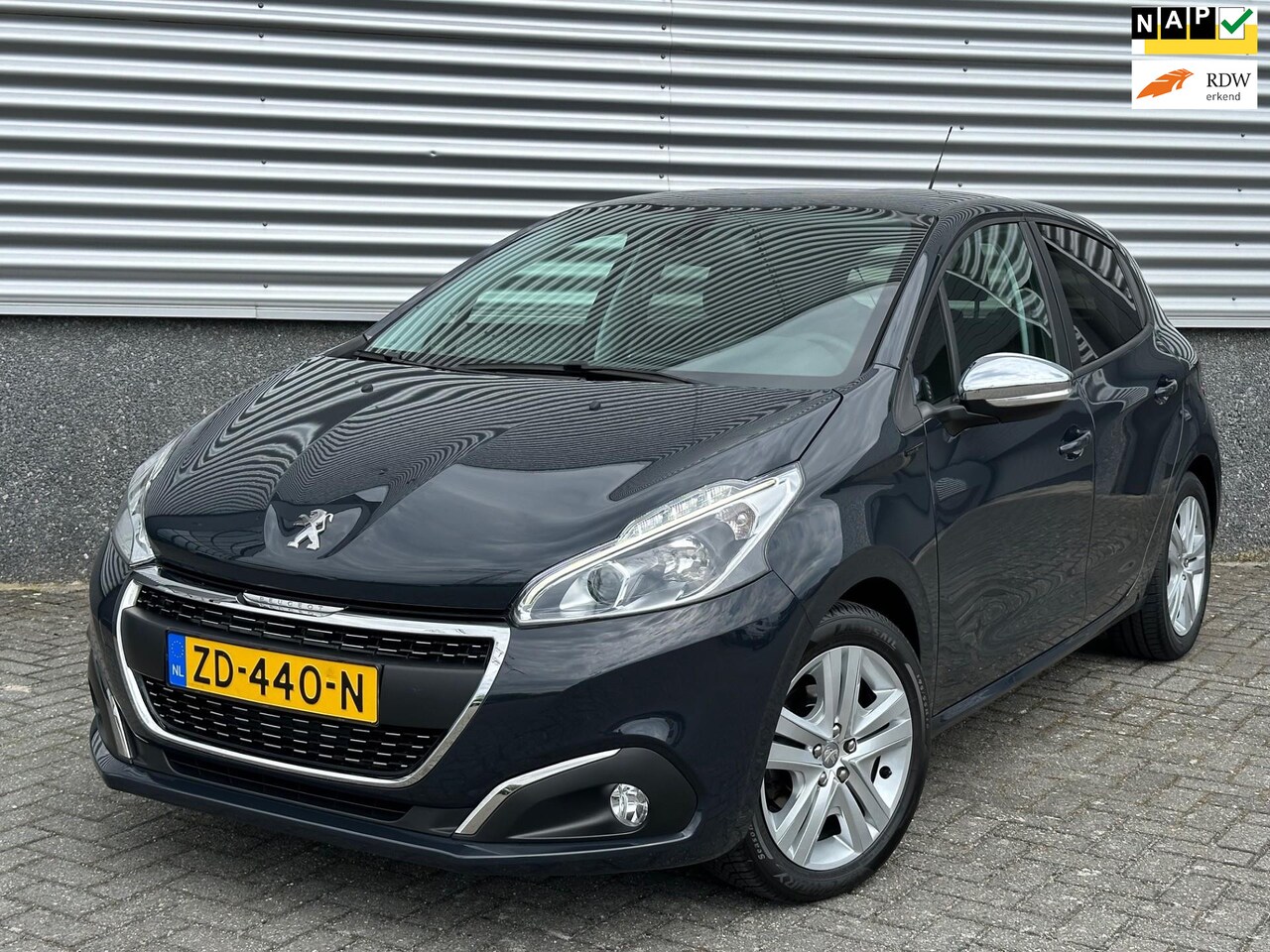 Peugeot 208 - 1.2 PureTech Signature Navi Cruise Org NL - AutoWereld.nl