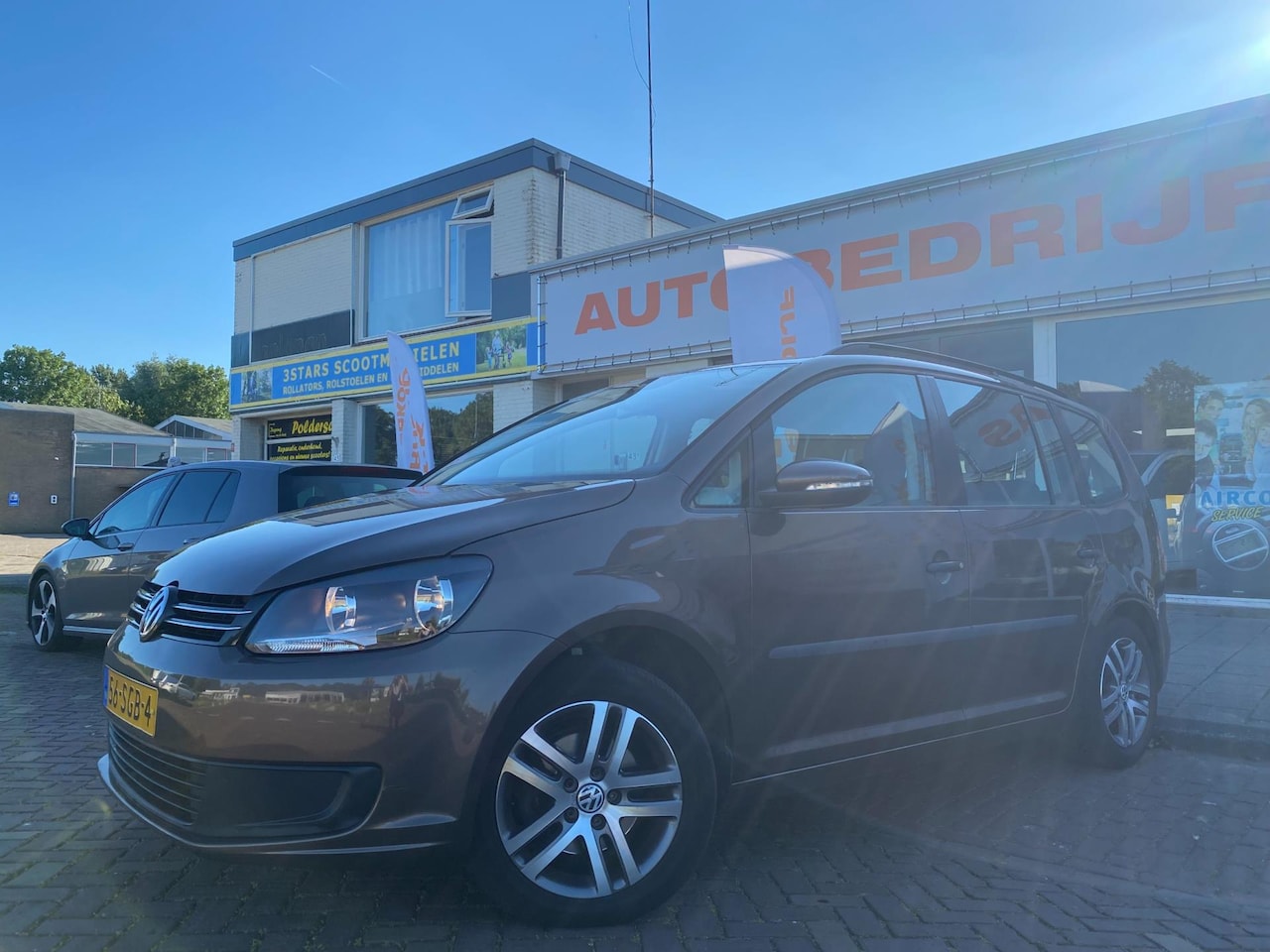 Volkswagen Touran - 1.2 TSI Trendline Bluemotion 7p. Airco Cruise Control - AutoWereld.nl