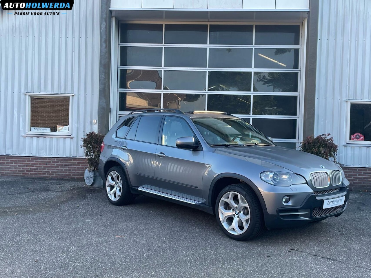 BMW X5 - 4.8i High EXE | Comfort | Pano | Headup | Softclose! - AutoWereld.nl