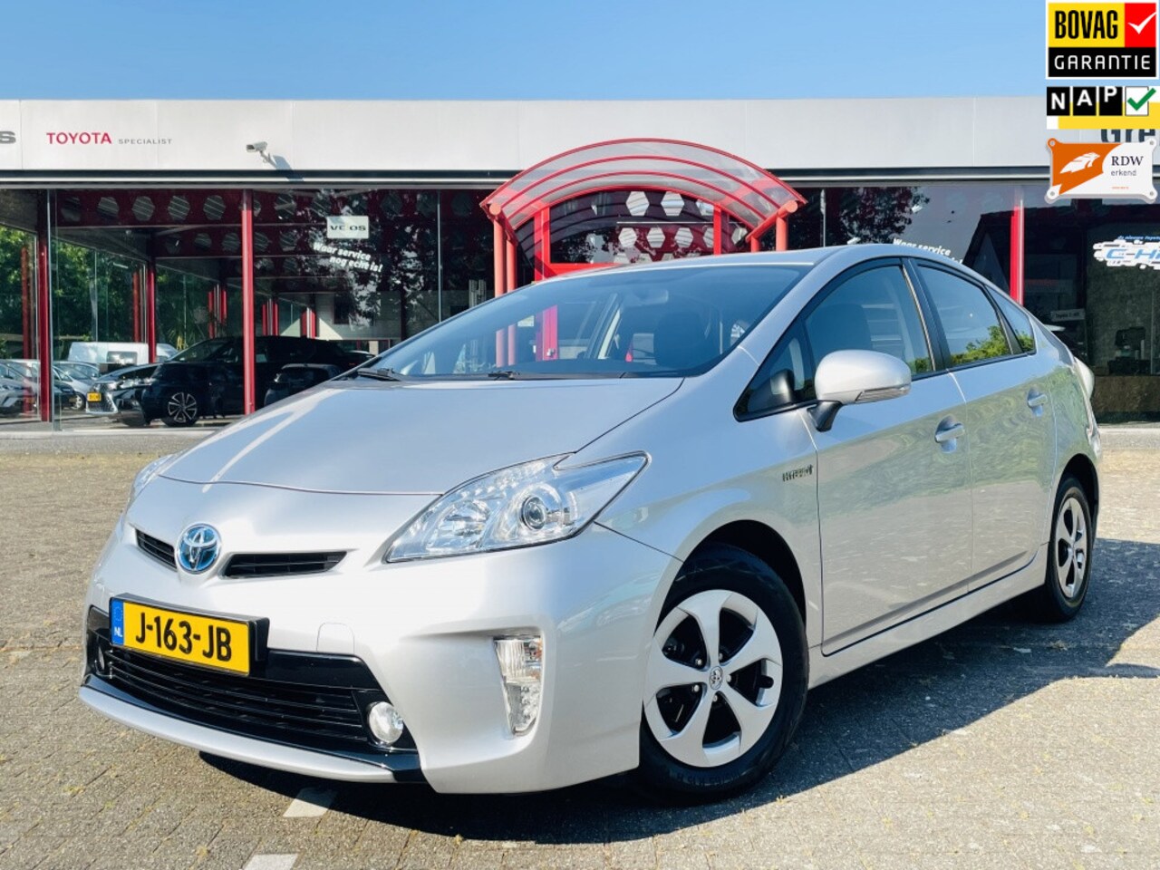 Toyota Prius - 1.8 Comfort Hybride Automaat | Climate | Keyless Entry - AutoWereld.nl