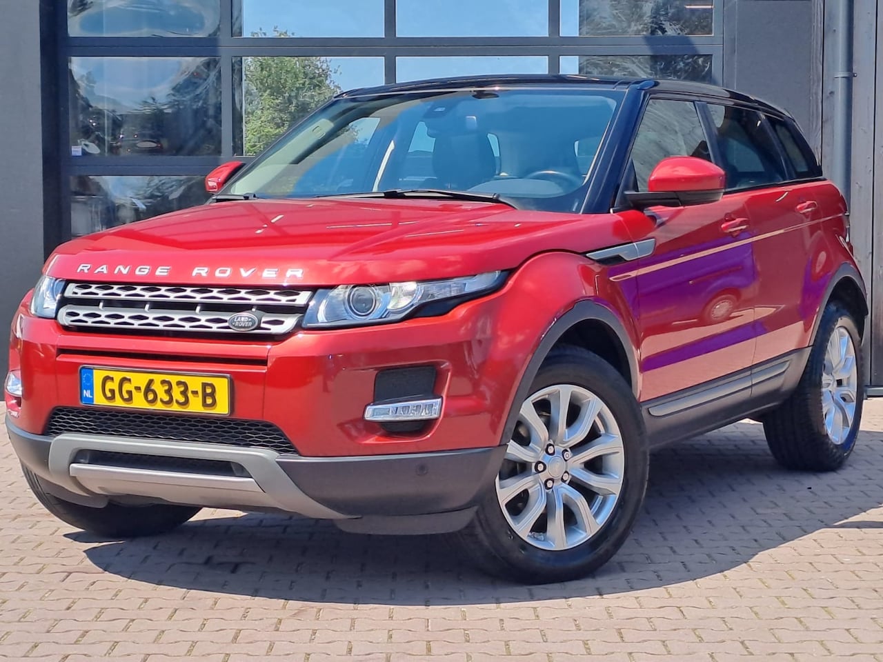 Land Rover Range Rover Evoque - 2.0 Si 4WD Pure Business Edition | Automaat | Pano | Trekhaak | Camera | Navi | Leder | 4X - AutoWereld.nl