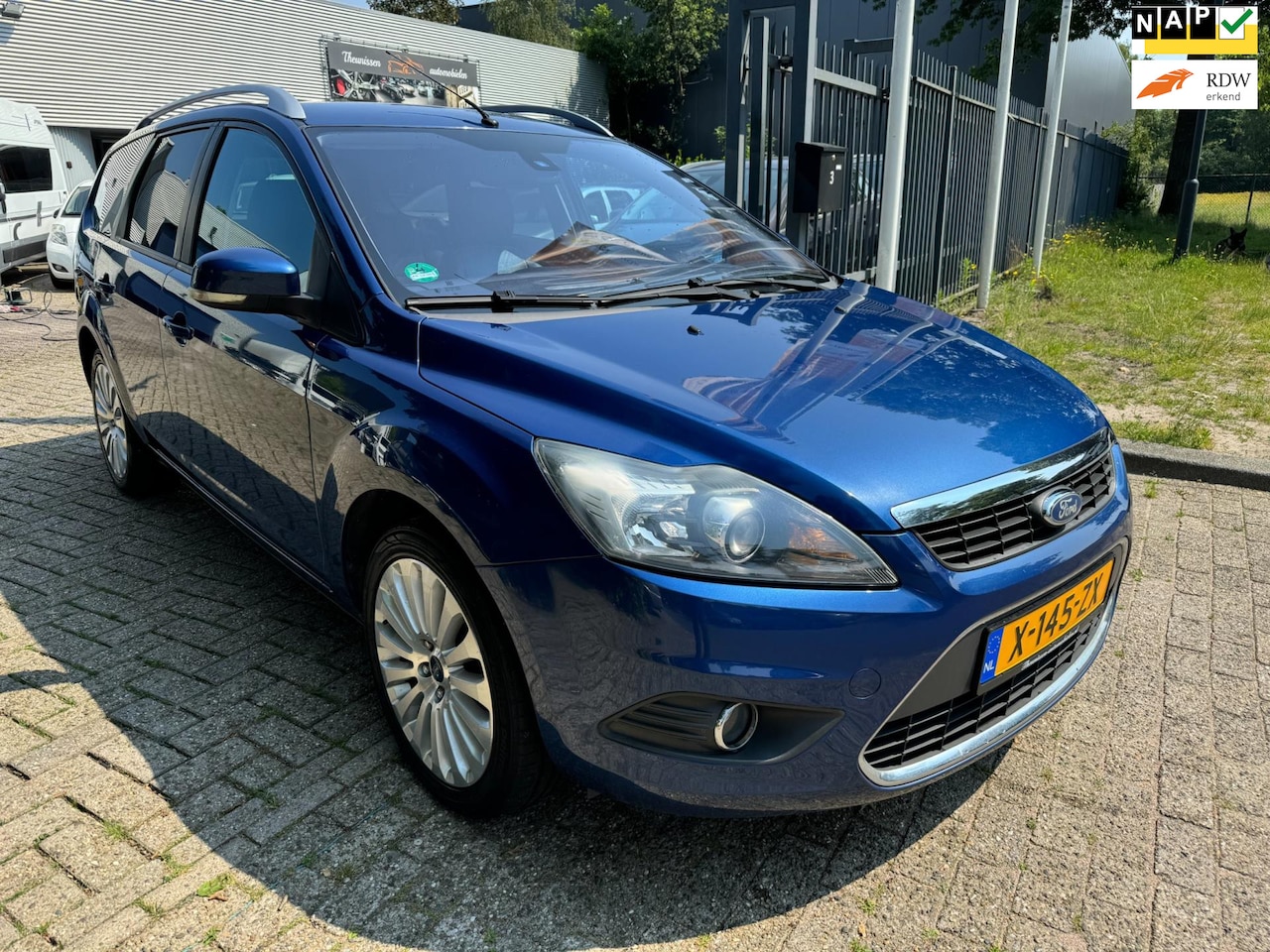 Ford Focus Wagon - 1.8 Titanium Flexi Fuel clima, elec pakket, alu wielen, getint glas navigatie, 106029 km, - AutoWereld.nl