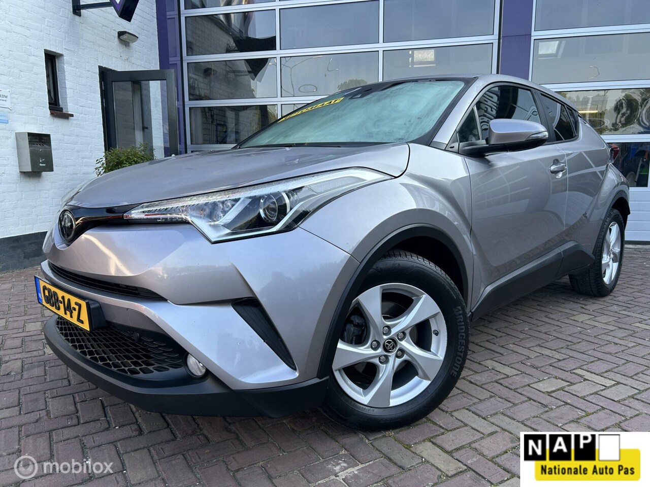 Toyota C-HR - 1.2 Executive * AUTOMAAT * NAVI * TREKHAAK * - AutoWereld.nl