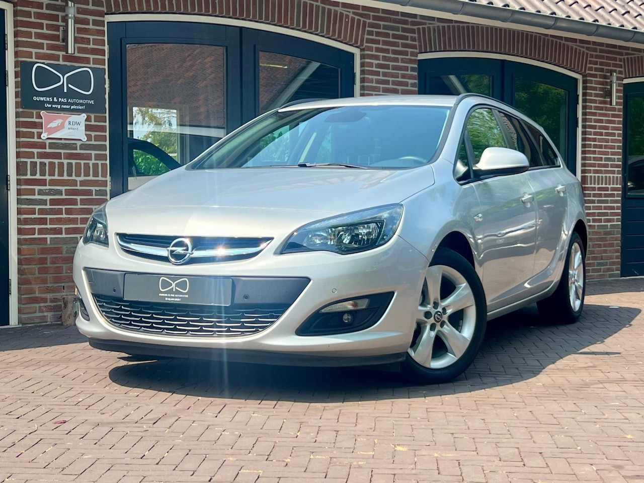 Opel Astra Sports Tourer - 1.4 Turbo Edition | NAVIGATIE | CAMERA | CRUISE | STUURWIELVERW. - AutoWereld.nl