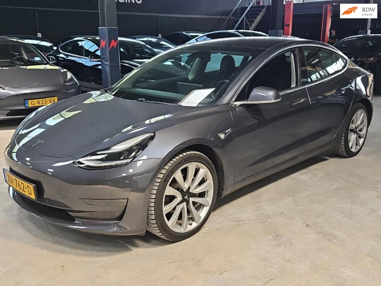 Tesla Model 3 - Long Range RWD Long Range 75 kWh Grijs FSD 19 Inch - AutoWereld.nl