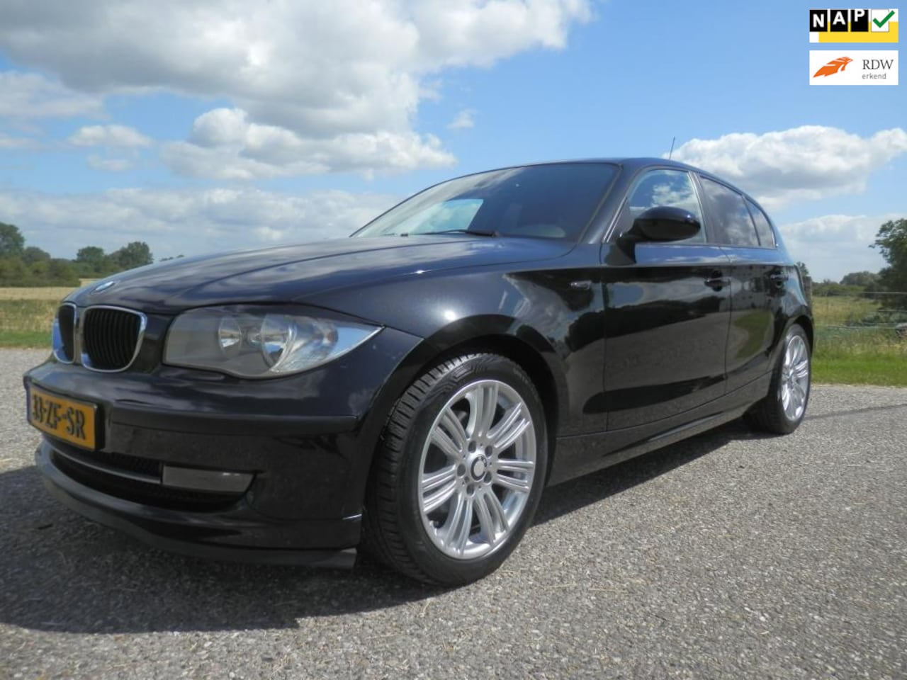 BMW 1-serie - 116i Business Line airco 213996 km nap bj 2008 5drs - AutoWereld.nl