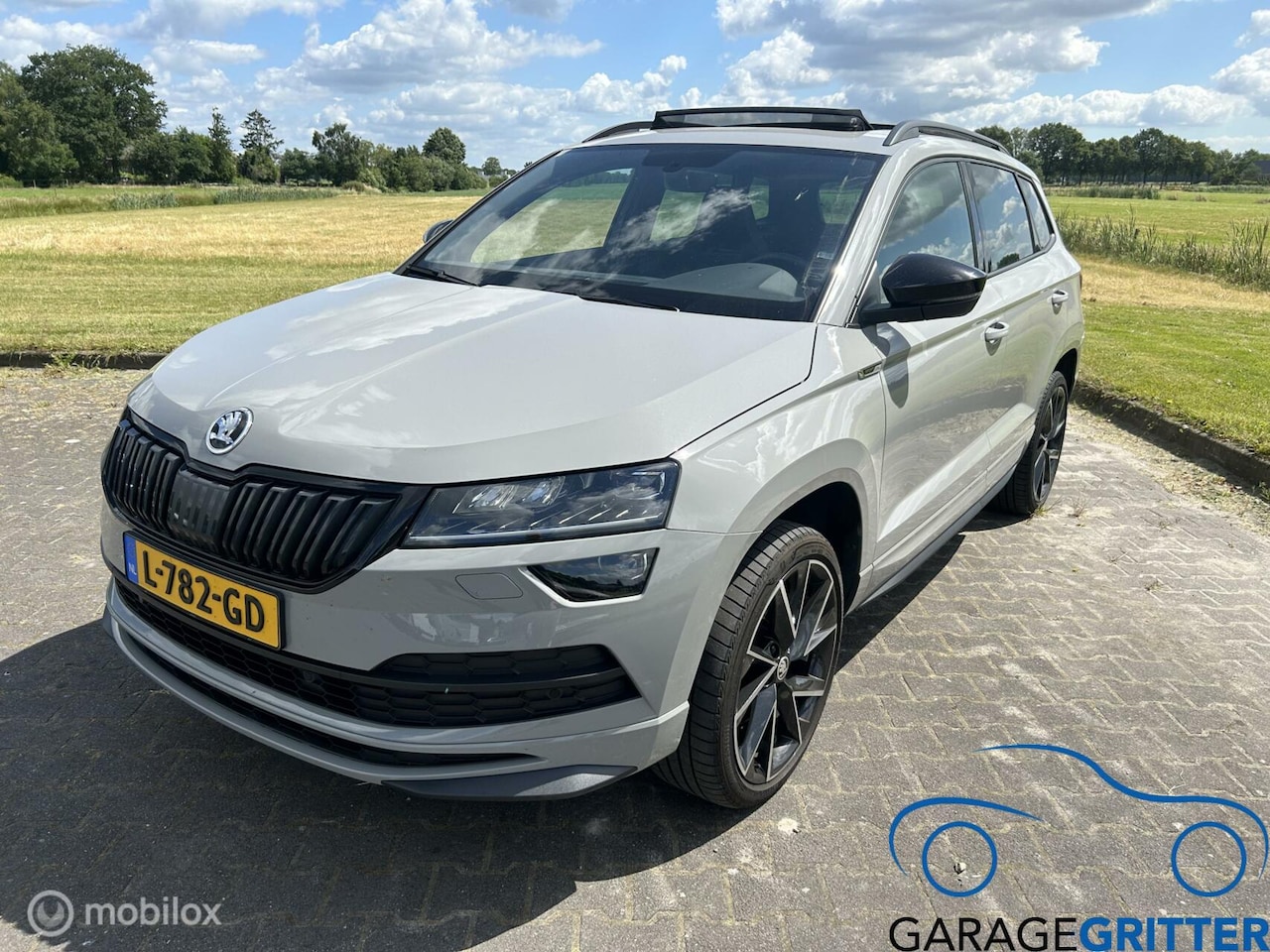 Skoda Karoq - 1.5 TSI ACT Sportline Business 1.5 TSI ACT Sportline Business - AutoWereld.nl