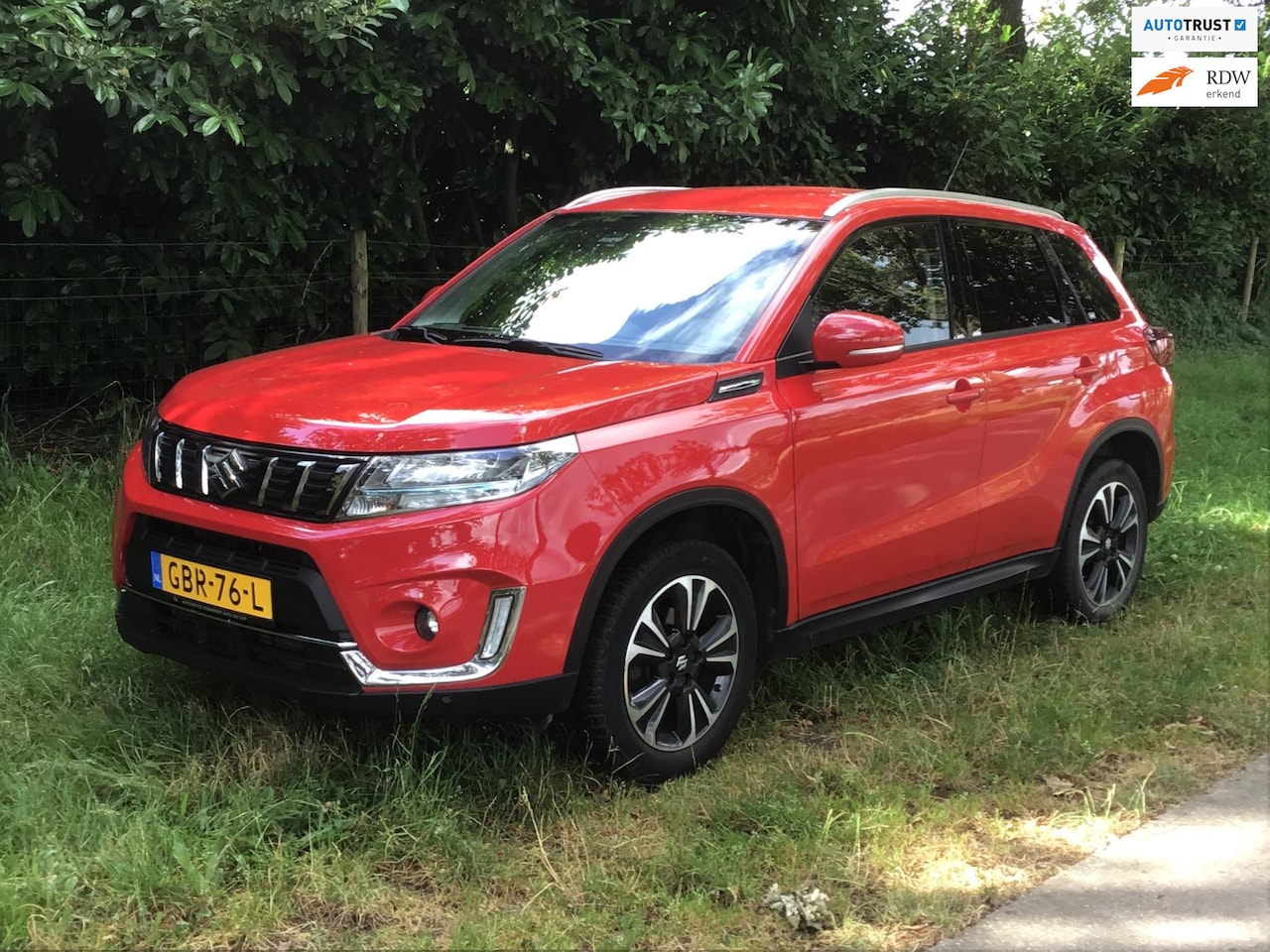 Suzuki Vitara - 1.4 Boosterjet Style Smart Hybrid. 1e eig./dealeronderhouden - AutoWereld.nl