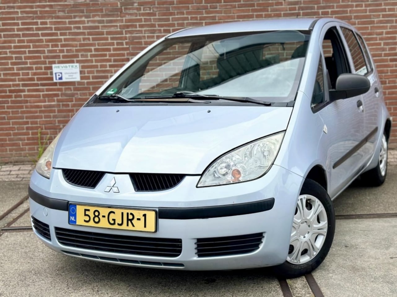 Mitsubishi Colt - 1.1 Incharge - AutoWereld.nl