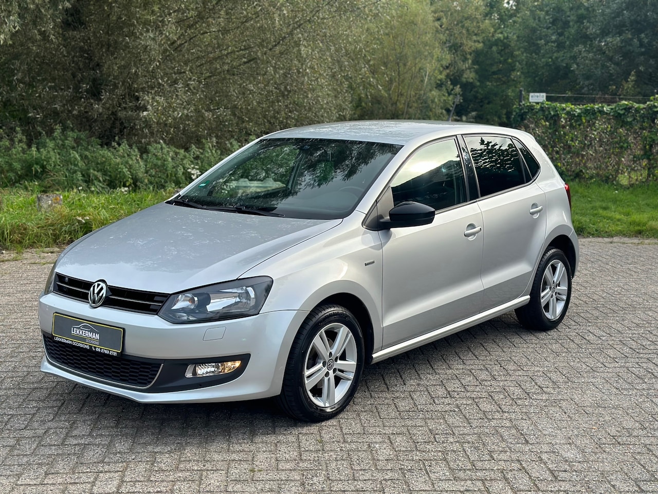 Volkswagen Polo - 1.2 High Line COMPLEET ONDH I CRUISE I LUXE UITV. I PDC - AutoWereld.nl