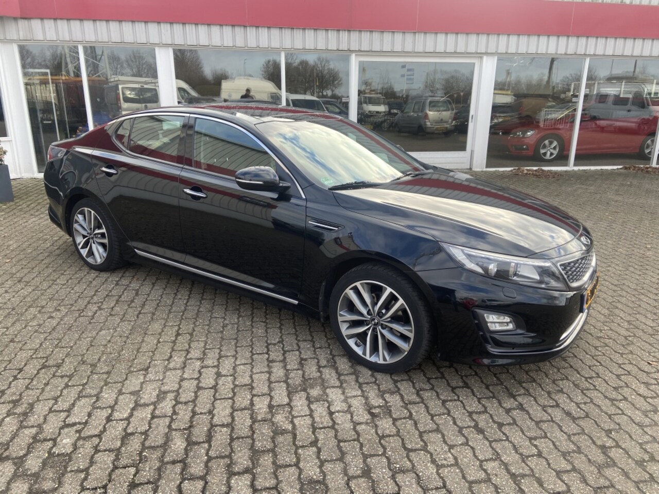 Kia Optima - 2.0 CVVT Hybrid Ex.L - AutoWereld.nl