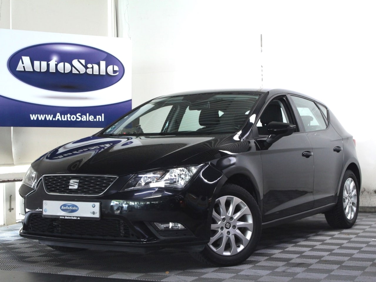 Seat Leon - 1.2 TSI DSG Style 2eEIG NAVI BT PDC CRUISE STOELVW ECC '13 - AutoWereld.nl