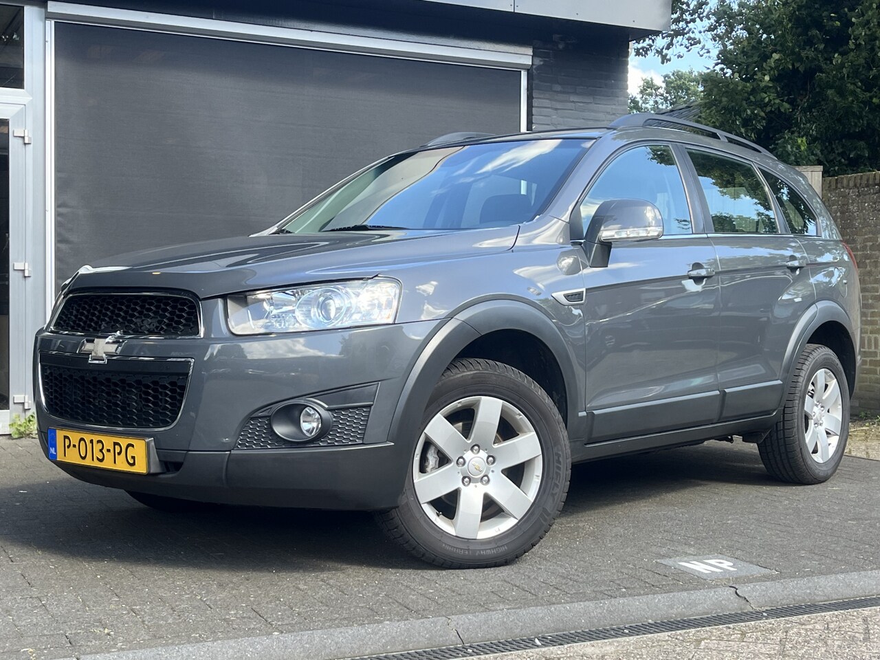 Chevrolet Captiva - 2.4i LT 2WD NAVI / CLIMA / CRUISE / ACHTERUITRIJCAMERA - AutoWereld.nl