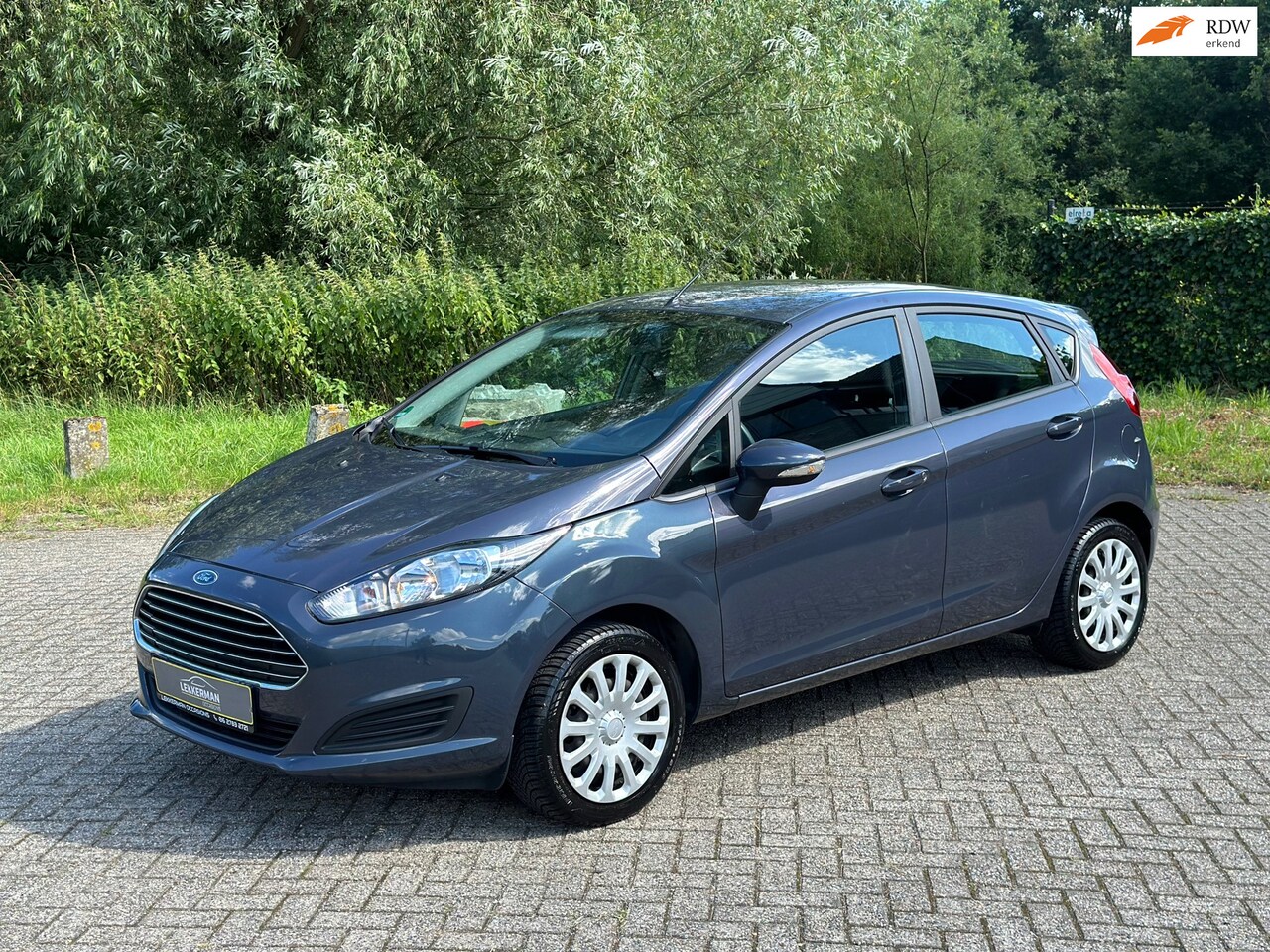 Ford Fiesta - 1.25 Titanium 82PK I CLIMA I STOELVERW I COMP. ONDERHOUD I NWE APK - AutoWereld.nl