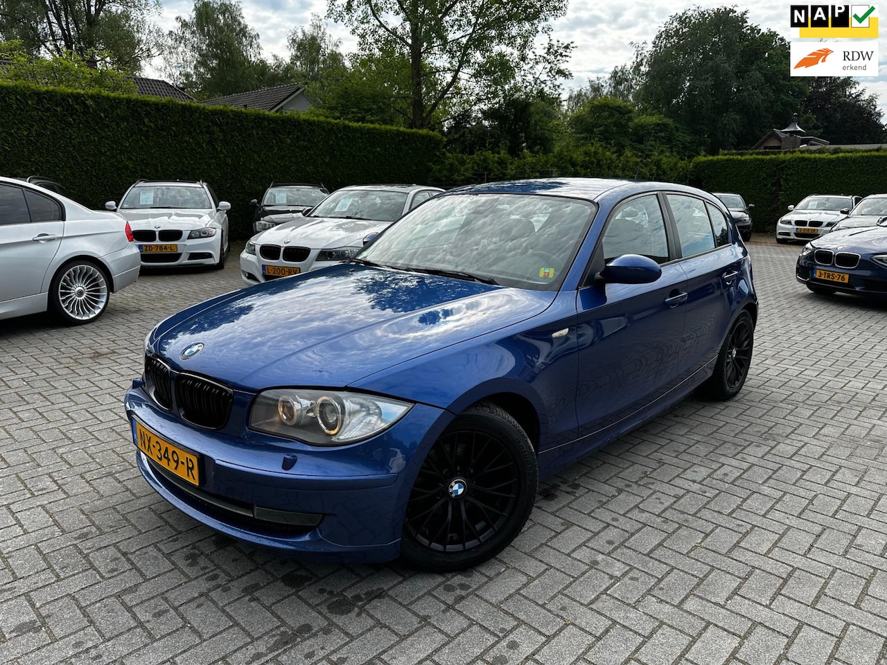 BMW 1-serie - 116i Executive|Ketting verv.|Xenon|Navi|Half Leder|Cruise control|Climate control.. - AutoWereld.nl