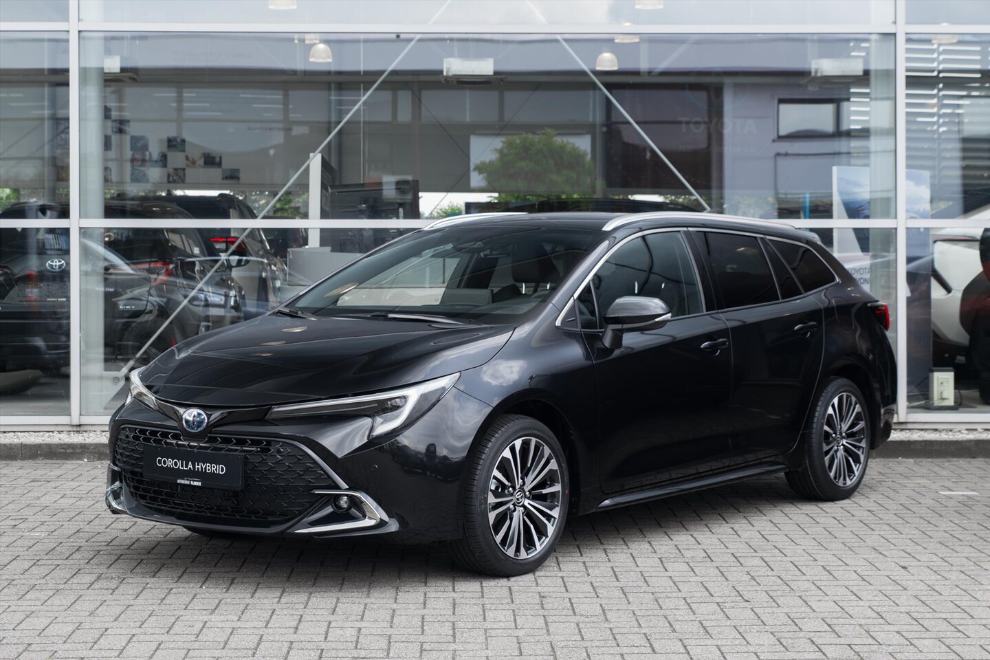 Toyota Corolla Touring Sports - Hybrid 140 Business Plus - AutoWereld.nl