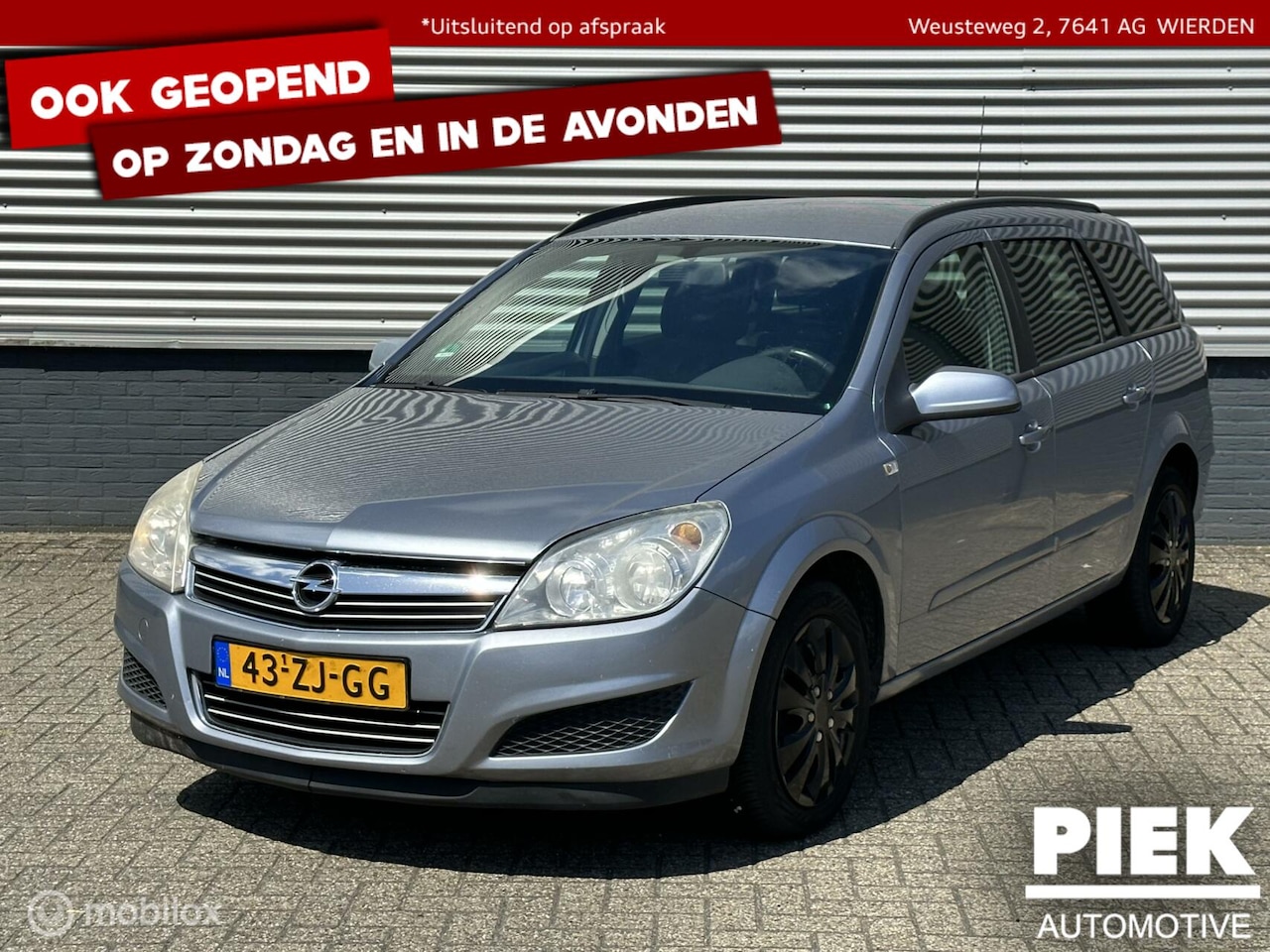 Opel Astra Wagon - 1.9 CDTi Cosmo TREKHAAK - AutoWereld.nl