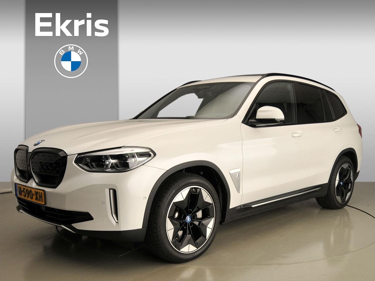 BMW iX3 - High Executive 80 kWh LED / Leder / HUD / Trekhaak / Schuifdak / Sportstoelen / DAB / Harm - AutoWereld.nl