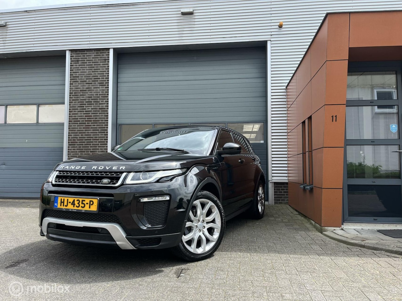 Land Rover Range Rover Evoque - 2.0 Si 4WD Dynamic Business Edition panorama - AutoWereld.nl