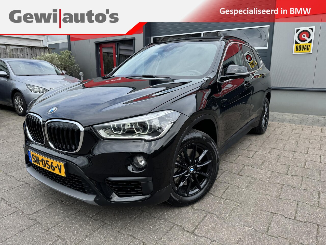 BMW X1 - sDrive20i Executive Panoramadak - AutoWereld.nl