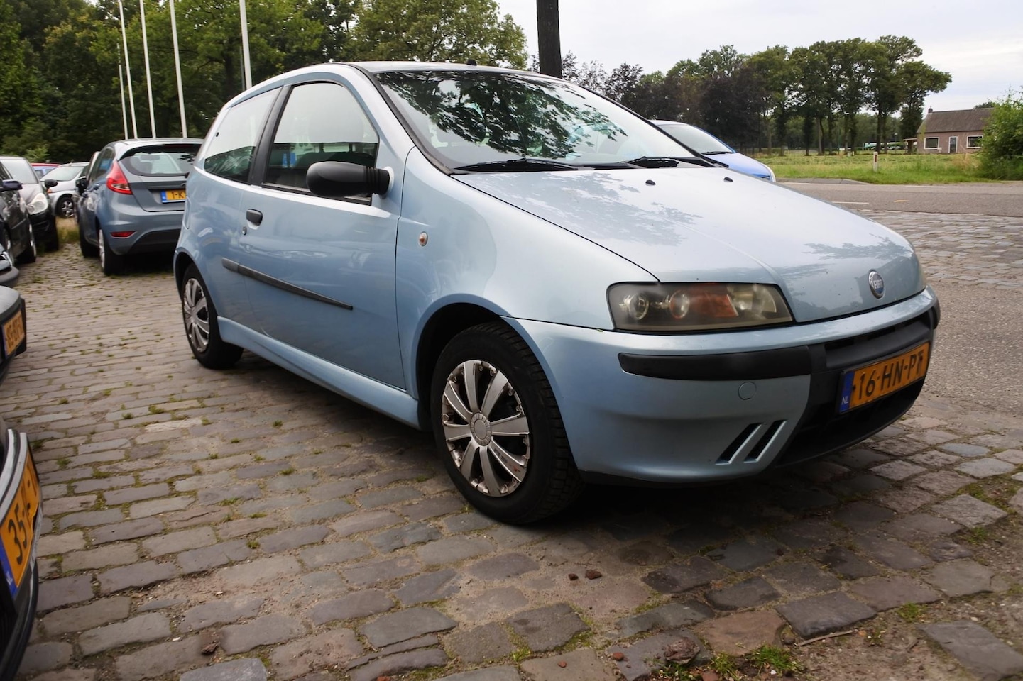 Fiat Punto - 1.2-16V Dynamic airco nw apk tot 9-7-2025 - AutoWereld.nl