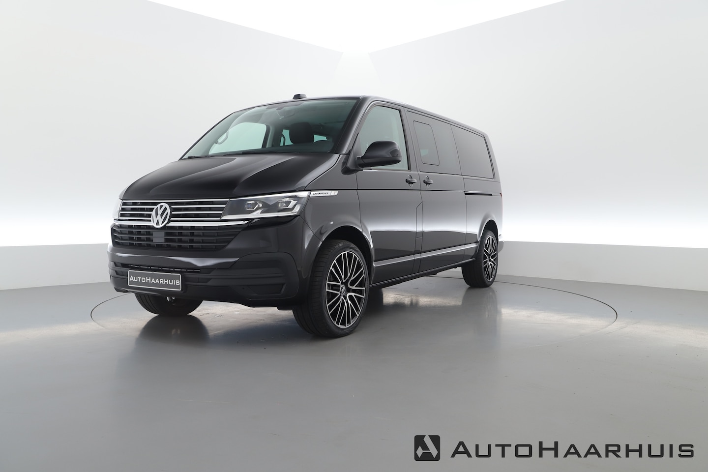 Volkswagen Transporter Caravelle - 2.0 TDI 204pk DSG L2H1 | Adapt. Cruise | Navi | 2x Schuifdeur | 20'' LM velgen - AutoWereld.nl