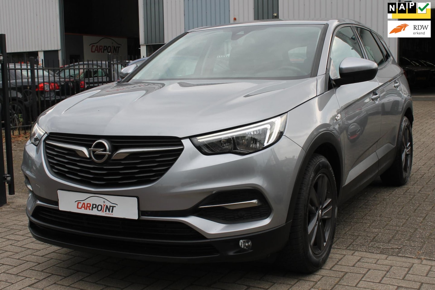 Opel Grandland X - 1.2 Turbo Edition 120Yrs Navi Camera Clima Cruise Trekhaak! - AutoWereld.nl