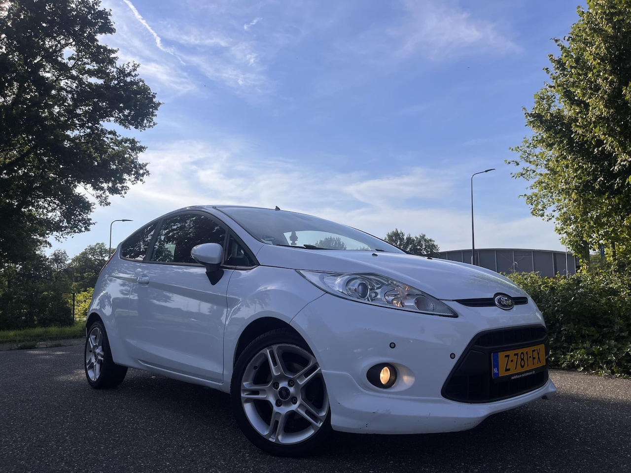 Ford Fiesta - 1.4 SPORT-97 PK ST LINE LEDER-AIRCO-STOELVERWARMING - AutoWereld.nl