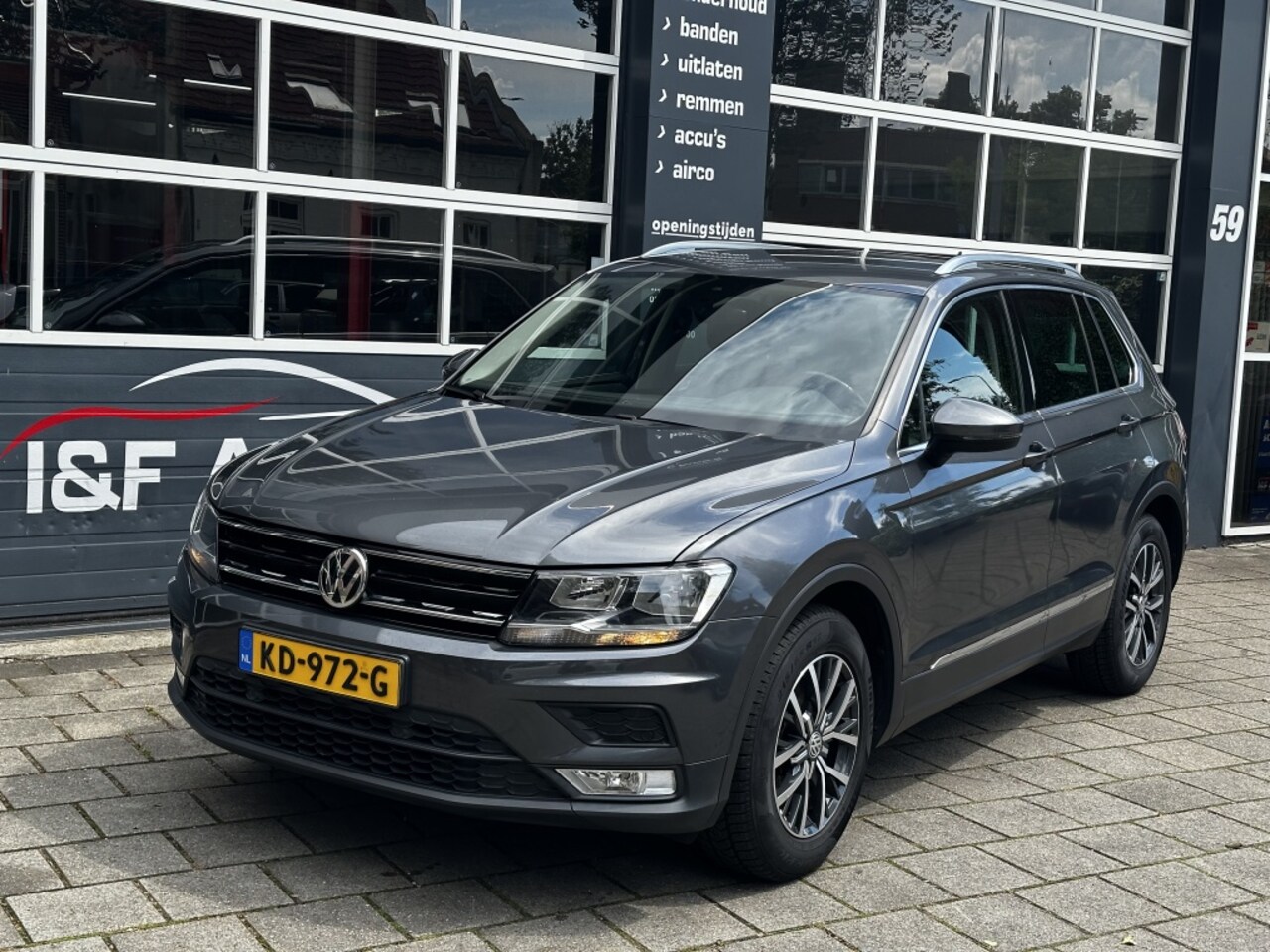 Volkswagen Tiguan - 1.4 TSI 125 PK Trekhaak Leder Ecc Pdc - AutoWereld.nl