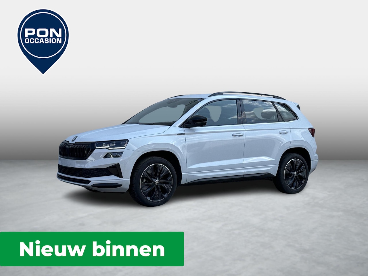 Skoda Karoq - 1.5 TSI ACT Sportline Business | NIEUW BINNEN | Adaptive Cruise | Parkeersensoren | Keyles - AutoWereld.nl