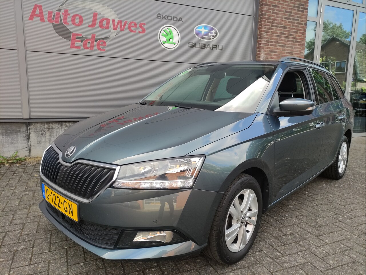 Skoda Fabia Combi - 1.0 TSI Style Navigatie - Parkeersensoren V+A - Donker getinte ramen - LMV - AutoWereld.nl