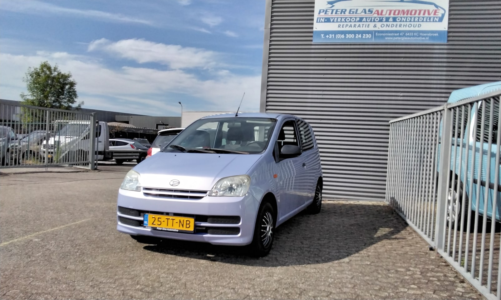 Daihatsu Cuore - 1.0-12V Sporty Airco - 2e eigenaar - AutoWereld.nl