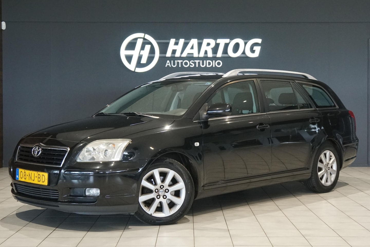 Toyota Avensis Wagon - 1.8 VVTi Linea Luna + TREKHAAK - AutoWereld.nl