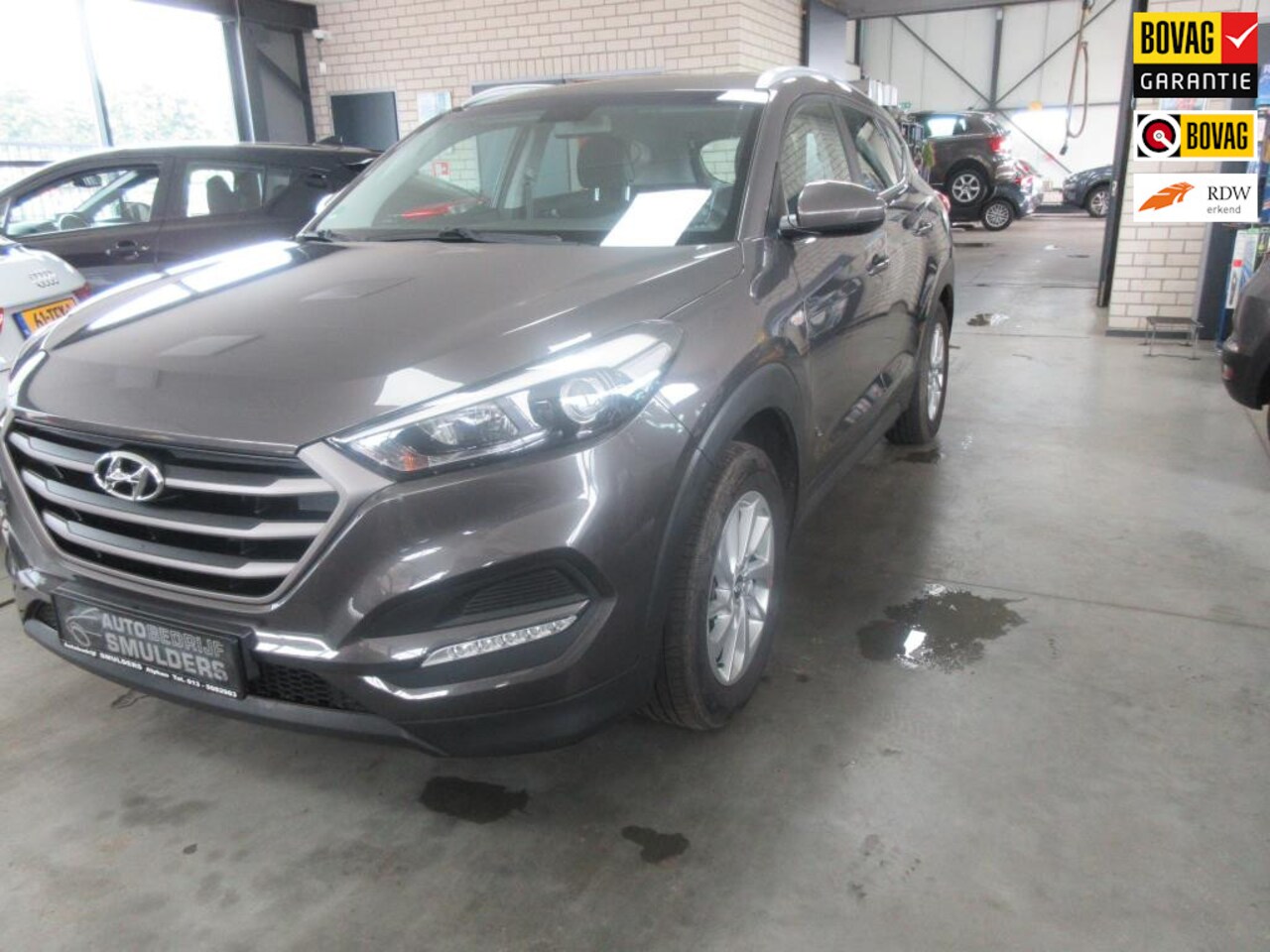 Hyundai Tucson - 1.6 T-GDI Comfort 1.6 T-GDi Comfort,navi,camera,climate en cruise control,etc.... - AutoWereld.nl